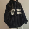 Black oversized zip-up hoodie with a front graphic print